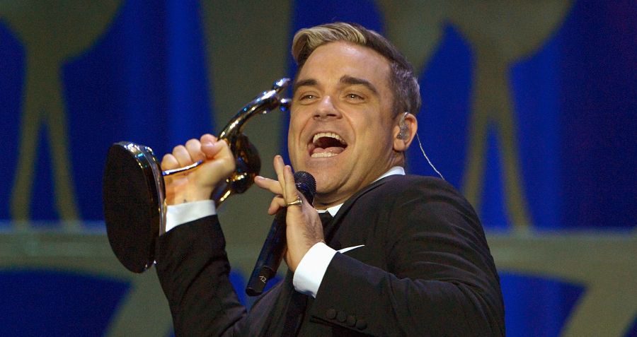 Robbie Williams di nuovo papà grazie alla maternità surrogata, foto